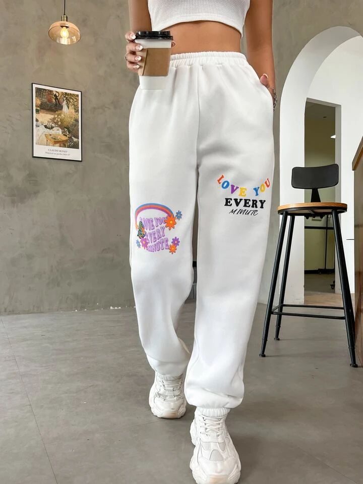 WHITE GRAPHIC PRINT SWEATPANTS